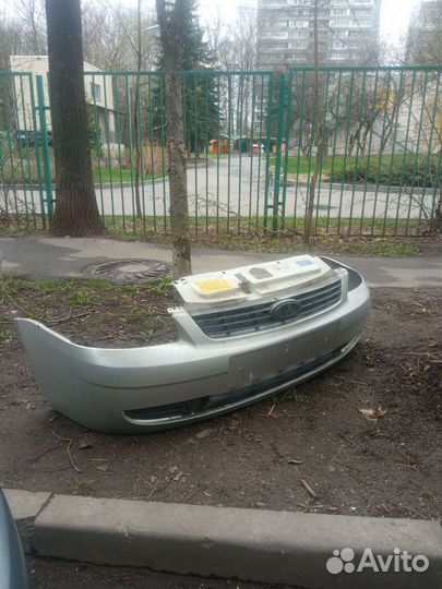 Бампер передний priora 1