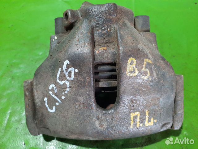 Суппорт тормозной Volkswagen Passat слева спереди