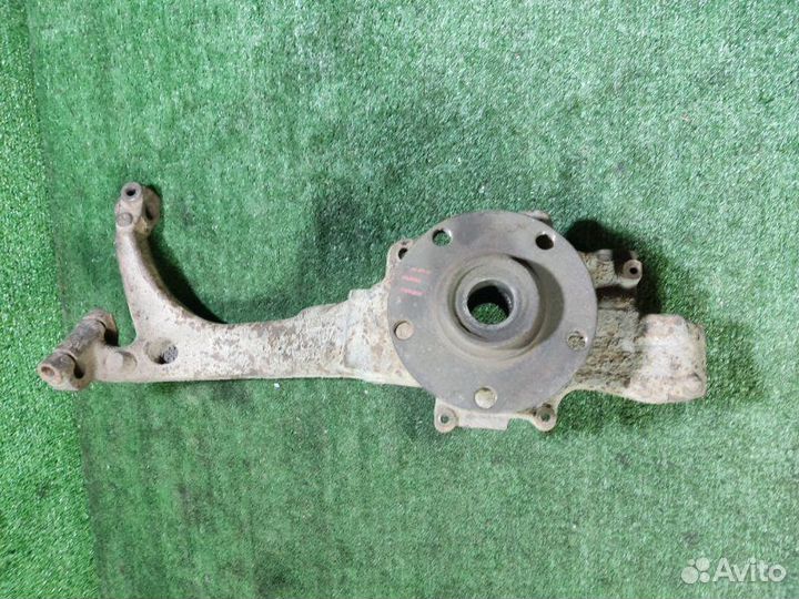 Кулак поворотный передний левый Volkswagen Passat