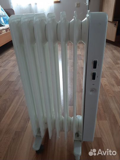 Масляный электрообогреватель