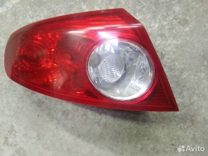 Фонарь задний левый Шевроле Лачетти хэтчбек