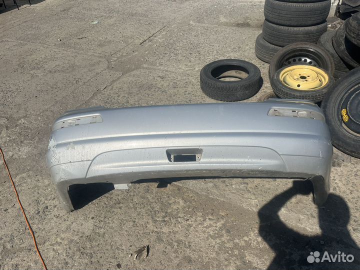 Бампер задний Nissan Tiida c11 седан