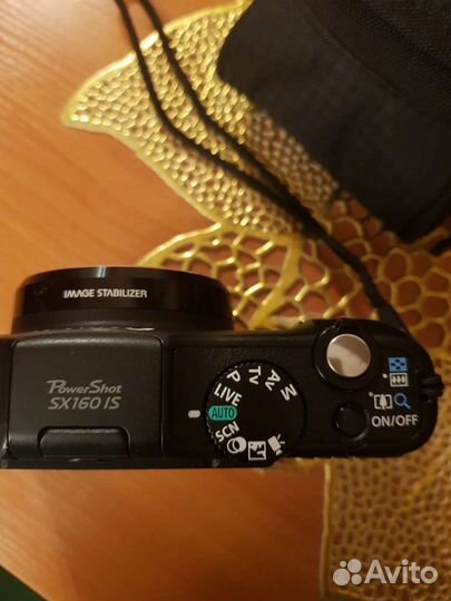 Компактный фотоаппарат canon