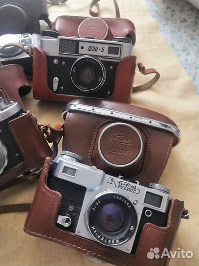 Фотоаппараты, кинопроекторы