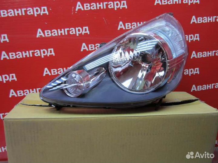 Фара левая Honda Fit GD 01-07