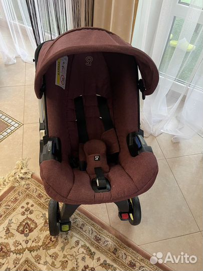 Коляска автокресло doona с базой isofix