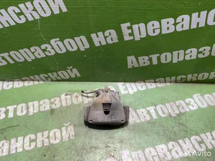 Суппорт тормозной передний правый Opel Astra H