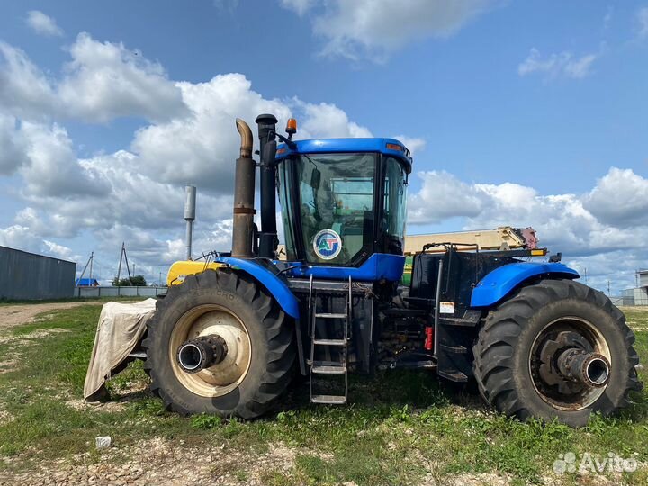 Трактор new holland Т9040