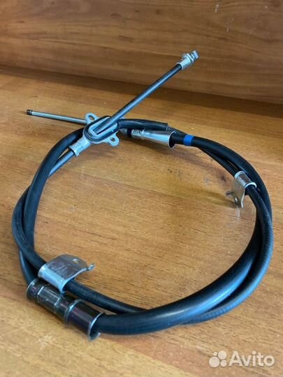 Трос стояночного тормоза правый Toyota Camry 2006