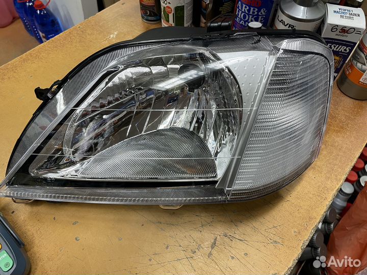 Фара левая рено логан Renault Logan