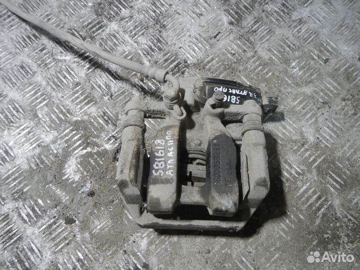 Суппорт задний правый Geely Atlas Pro