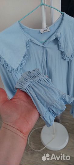 Блузка голубая