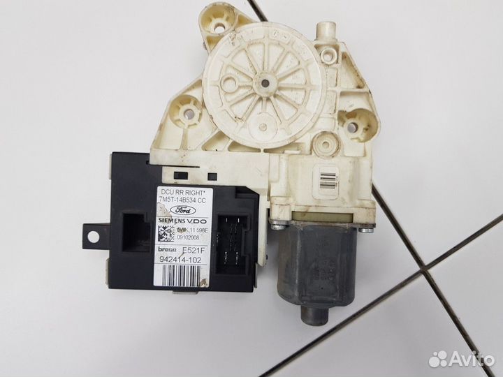 Моторчик стеклоподъемника задний правый