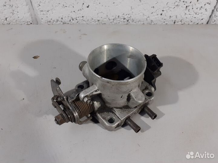 Дроссельная заслонка на змз-406