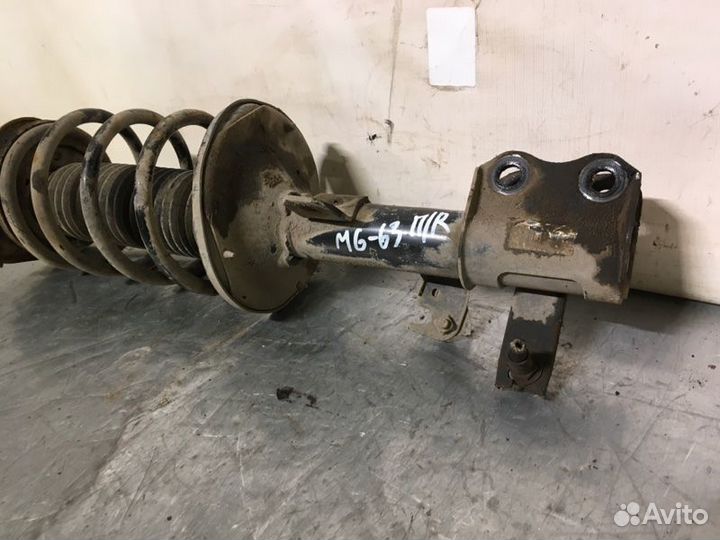 Стойка подвески передняя правая Geely Emgrand Ec7