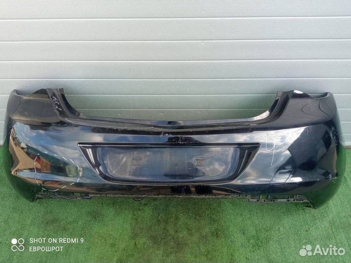 Бампер задний Opel Astra J (2010-2016)