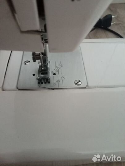 Электрическая швейная машина