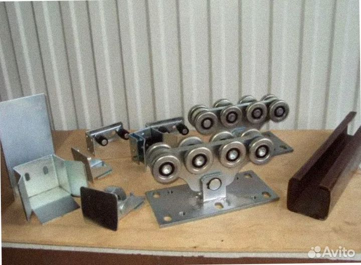 Ролики и направляющие балки для откатных ворот