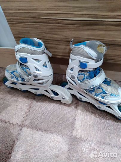 Роликовые коньки