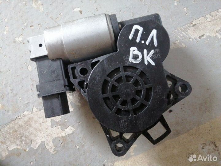 Моторчик стеклоподъемника передний левый Mazda 3