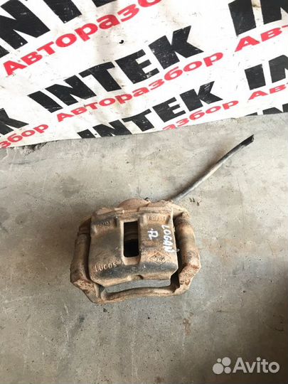 Суппорт передний левый Renault Logan