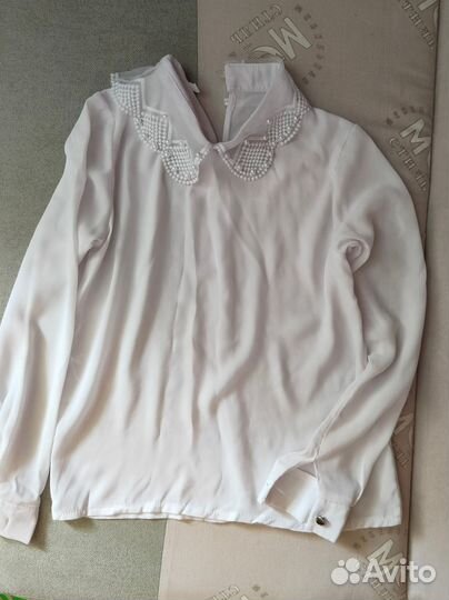 Блузки на девочку 128