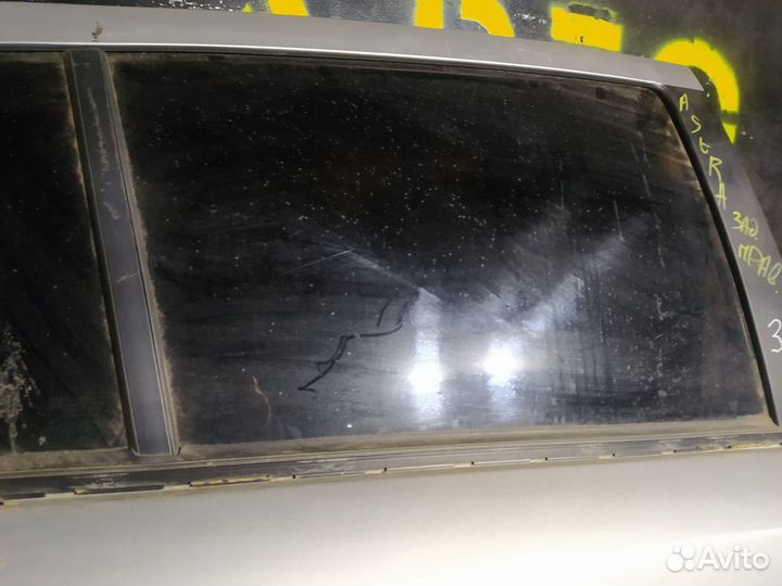 Стекло задней правой двери Opel Astra H
