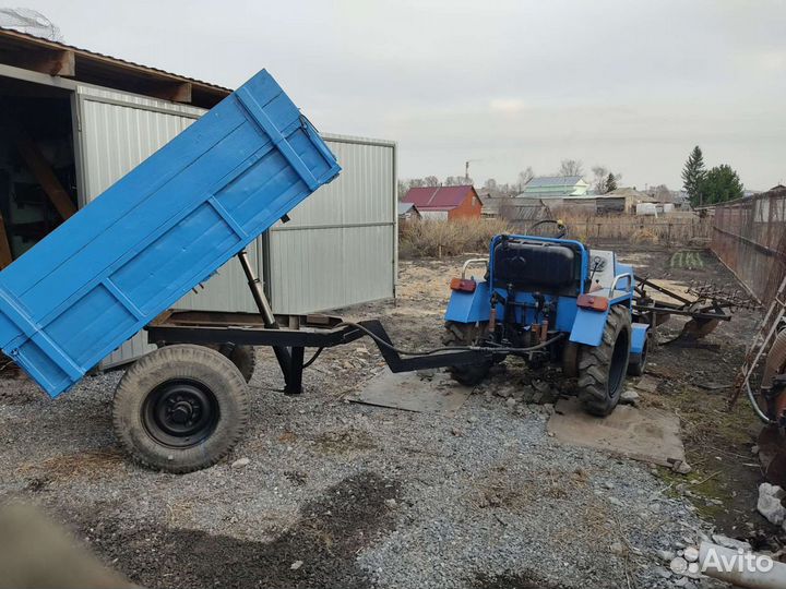 Мини-трактор, 2002