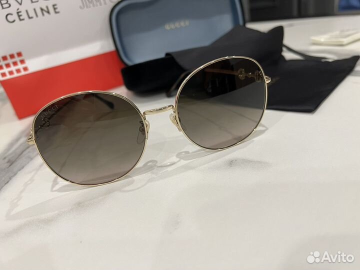 Солнцезащитные очки Gucci