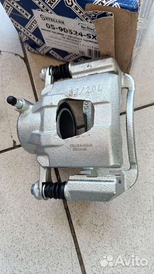 Суппорт тормозной передний левый в сборе