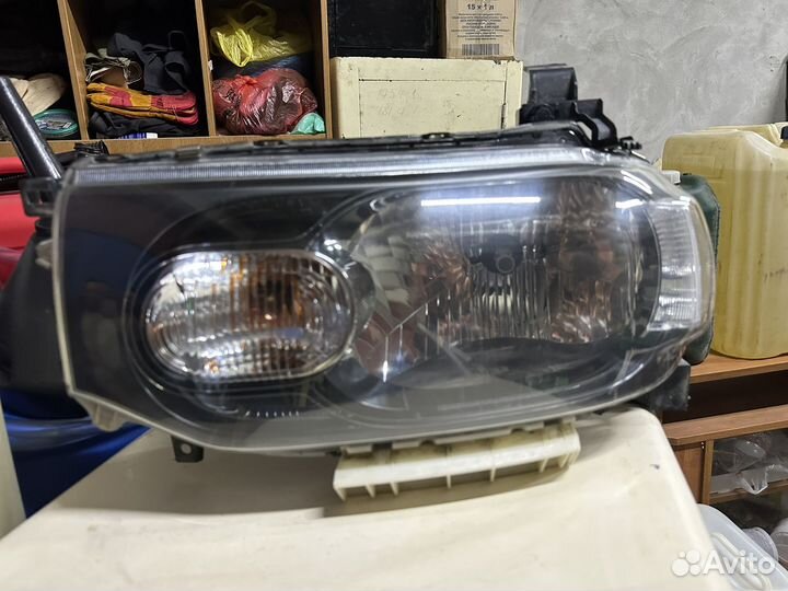 Фары Nissan Cube