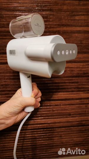 Новый ручной отпариватель для одежды