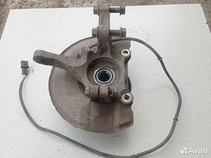 Кулак поворотный передний левый Mitsubishi Lancer