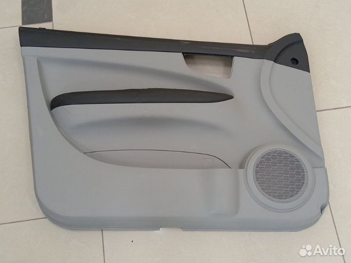 Обшивка двери передняя левая Тагаз Вега C100 2009