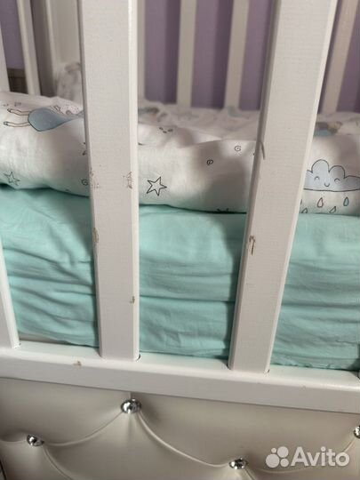 Детская кроватка с универсальным маятником