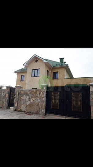 Коттедж 394 м² на участке 12 сот.