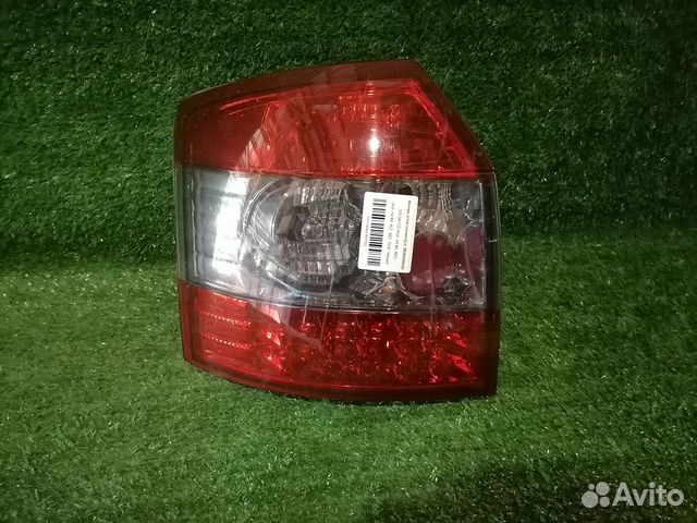 Фонарь (стоп сигнал) левый SK1611-ADA401SW Audi A4