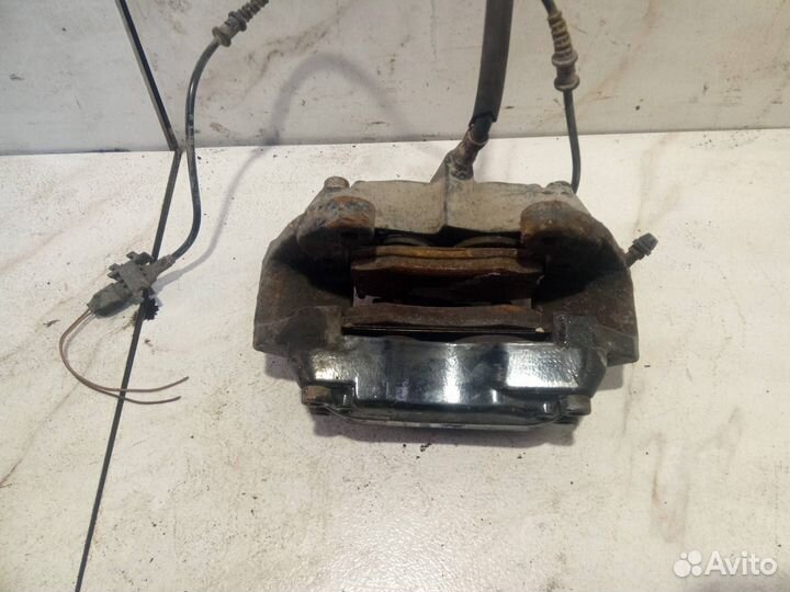 Суппорт тормозной передний левый Mercedes-Benz