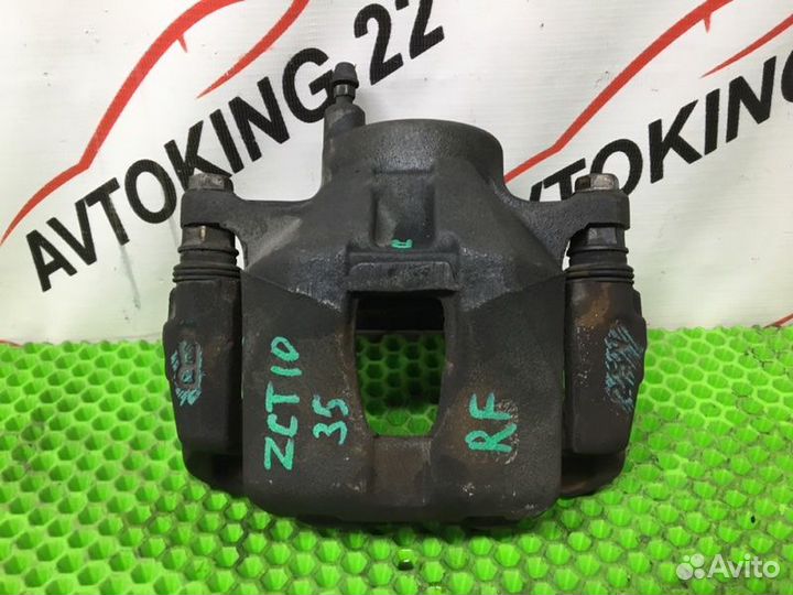 Суппорт тормозной передний правый Toyota Opa ZCT10