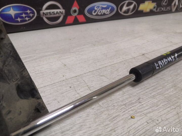 Амортизатор стекла двери багажника задний левый