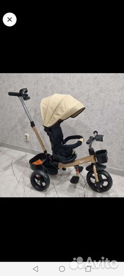 Трехколесный велосипед с ручкой