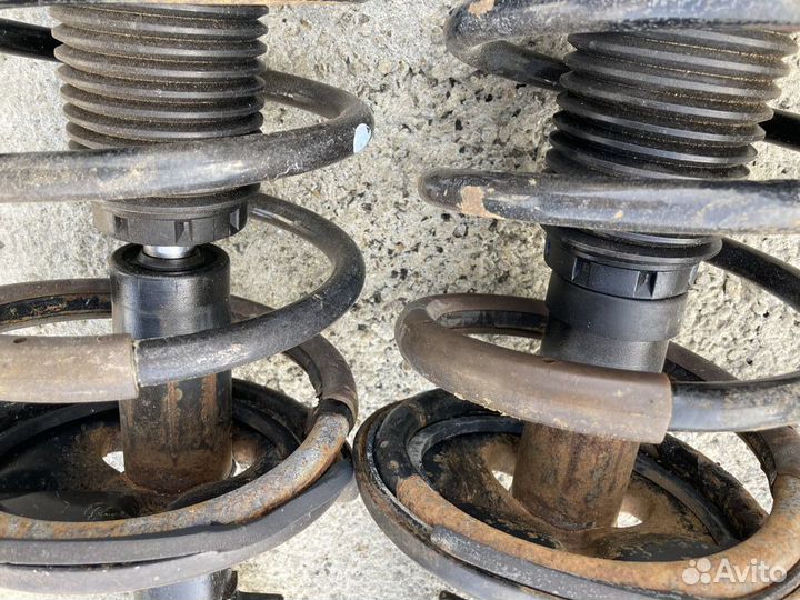 Передние стойки в сборе Шевроле Эпика