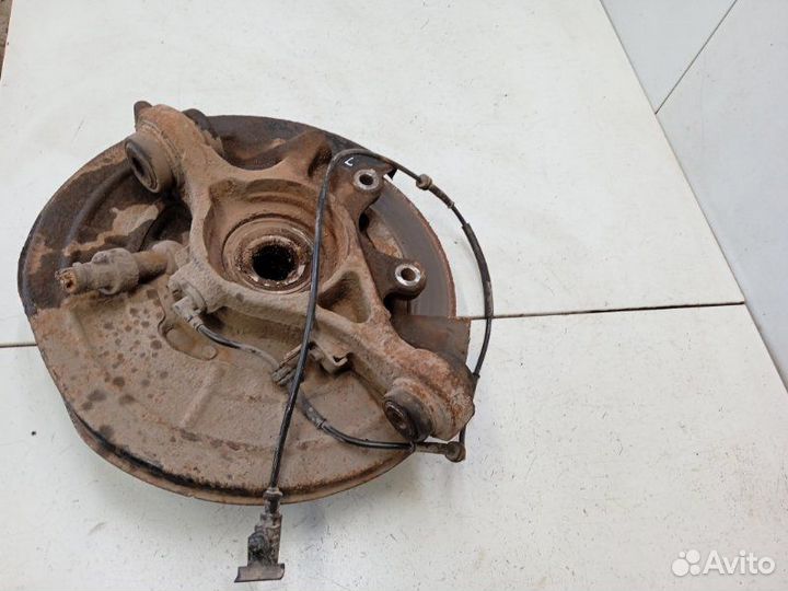 Кулак поворотный задний левый Land Rover Discovery