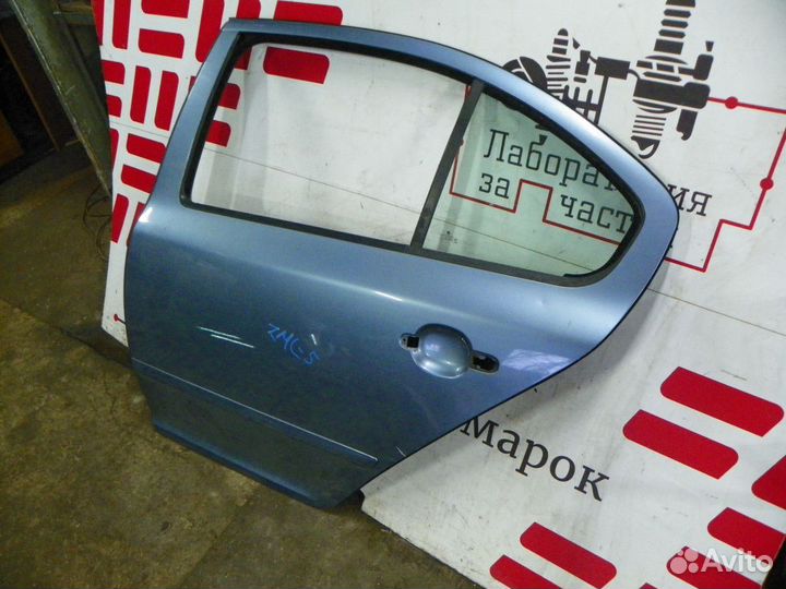 Дверь задняя левая Skoda Octavia