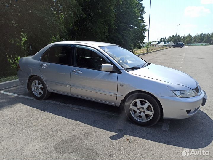 Mitsubishi Lancer 1.6 МТ, 2006, 413 523 км