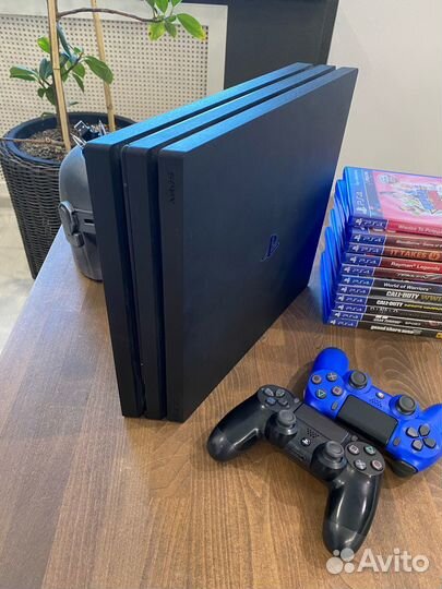 Sony ps4 pro 1tb - состояние новой с играми
