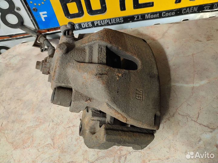 Opel astra Н тормозной суппорт