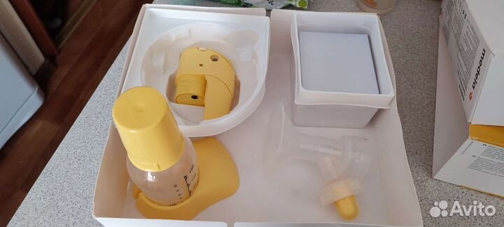 Молокоотсос medela электрический