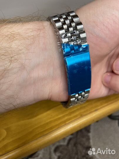Часы Rolex с белым циферблатом