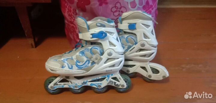 Роликовые коньки